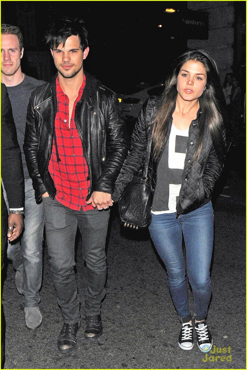 taylor lautner marie avgeropoulos matching jackets london 01